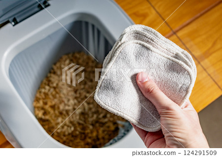 Dry toilet and washable wipe, water saving, compostable, wood chips, eco friendly gesture, durable lifestyle Dry toilet and washable wipe, water saving, compostable, wood chips, eco friendly gesture, durable lifestyle 124291509