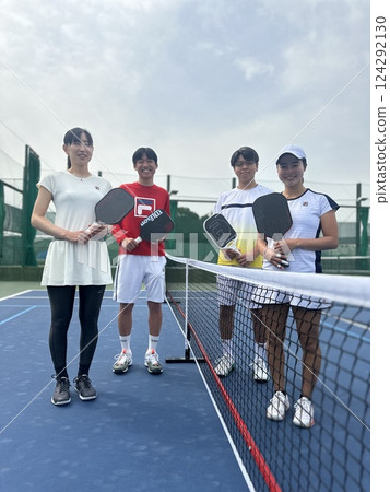 Young people playing pickleball 2 Young people playing pickleball 2 124292130