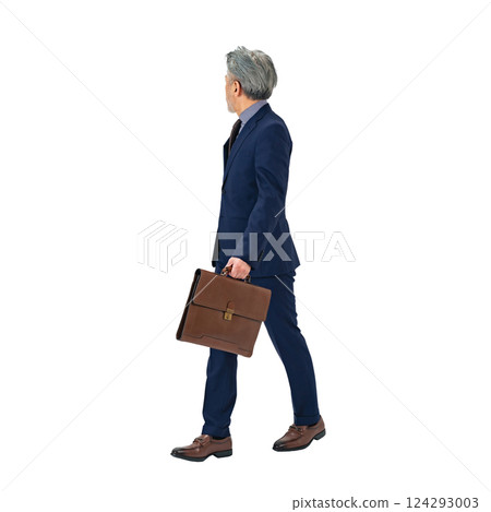 A middle-aged businessman looking back while walking. A transparent full-body photo PNG precisely cut by hand A middle-aged businessman looking back while walking. A transparent full-body photo PNG precisely cut by hand 124293003