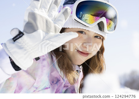 woman enjoying snow woman enjoying snow 124294776