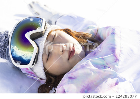 Woman enjoying ski Woman enjoying ski 124295077