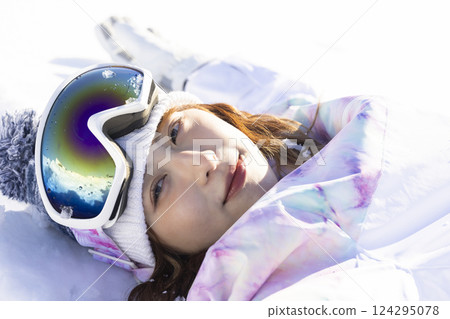 Woman enjoying ski Woman enjoying ski 124295078