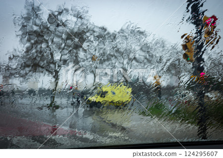 Raindrops on Glass: Urban Landscape in Stormy Weather 124295607