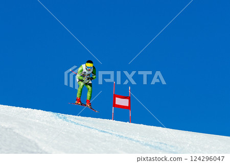 man ski racer perform jumping during competitive alpine skiing 124296047
