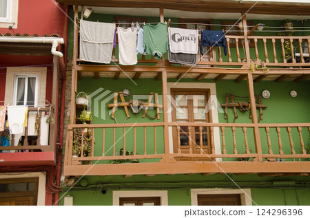 Houses with clothes hanging. Houses with clothes hanging. 124296396