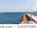 The quay of Takamatsu Port Ferry Terminal and the calm Seto Inland Sea as seen from Sunport Takamatsu 124297369