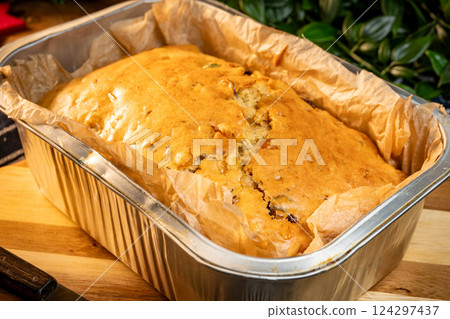 Christmas homemade fruitcake on the wooden background. 124297437