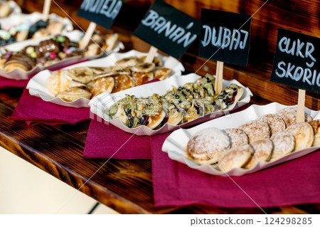 Assorted Sweet and Savory Pancake Toppings on Display 124298285