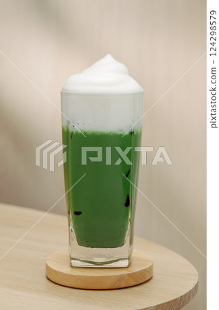 Iced Matcha with Froth Milk. A refreshing delight. 124298579