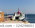View from Sunport Takamatsu of the ferry to Shodoshima preparing to depart and the blue sky of the Seto Inland Sea 124298601