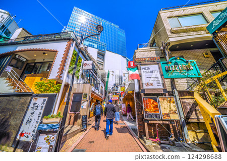 Tokyo cityscape in Japan: Shibuya bustling with inbound tourists. View of Spain Hill and other areas crowded with foreign tourists. 124298688
