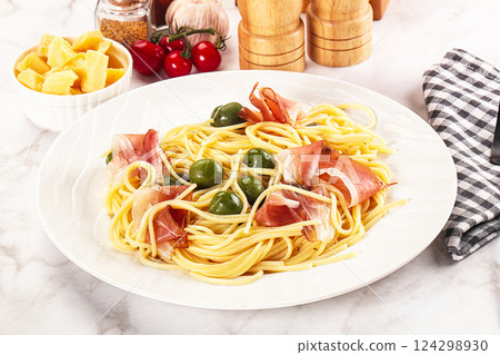 Pasta spaghetti with olives and jamon 124298930