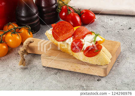 Bruschetta tapas with chorizo and tomato Bruschetta tapas with chorizo and tomato 124298976