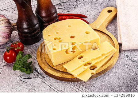 Maasdam cheese piece with slices Maasdam cheese piece with slices 124299010