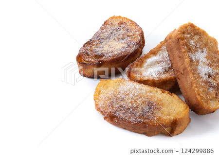 Traditional Spanish torrijas for Holy Week isolated on white background Traditional Spanish torrijas for Holy Week isolated on white background 124299886