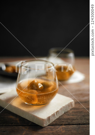 A glass of homemade Umeshu Plum Wine with soda 124300049