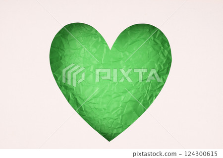 Green paper cut heart shape for decoration background. Green paper cut heart shape for decoration background. 124300615