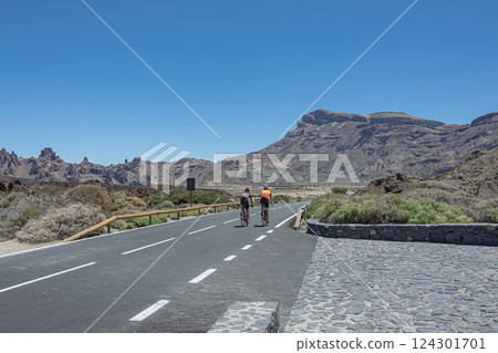 Spain, Tenerife - 05/10/2018: Mountain landscape. Training cyclists on a mountain road 124301701