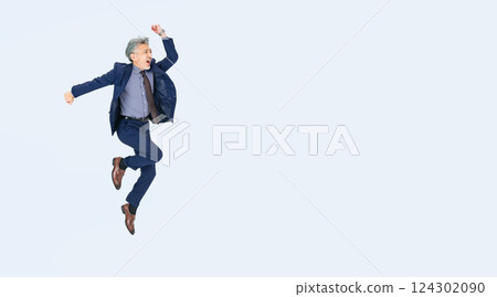 Full-body photo of a middle-aged male business person jumping energetically Full-body photo of a middle-aged male business person jumping energetically 124302090