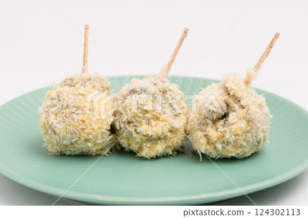 Breaded skewers before deep frying Breaded skewers before deep frying 124302113