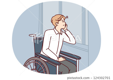 Unhappy handicapped man sits in wheelchair and sadly looks out window suffering from loneliness 124302701