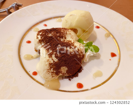 Tiramisu: A rich coffee dessert originating in Italy. Tiramisu: A rich coffee dessert originating in Italy. 124302852