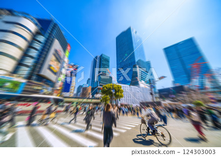 Tokyo cityscape in Japan - Crazy dangerous cyclist. The pedestrians hurriedly move out of the way as they nearly collided... What's going on in the Japanese brain? 124303003