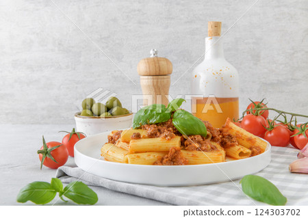 Italian rigatoni with meaty Bolognese sauce, classic setting 124303702