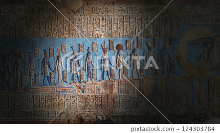 Hieroglyphic carvings and paintings on wall 124303784