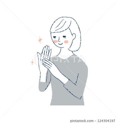Hand care: Woman looking at her beautiful hands Hand care: Woman looking at her beautiful hands 124304197