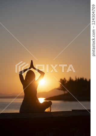 Meditation and mindfulness at sunset Meditation and mindfulness at sunset 124304709