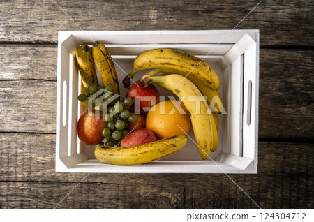 Fresh fruit in a white wooden crate 124304712