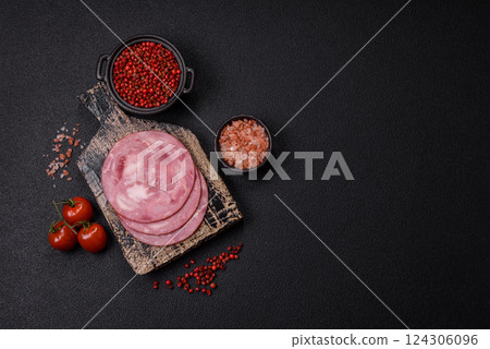 Boiled ham with salt and spices cut into slices 124306096