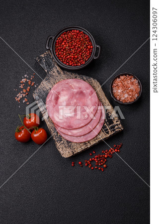 Boiled ham with salt and spices cut into slices 124306097