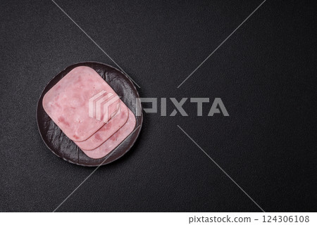 Boiled ham with salt and spices cut into slices 124306108