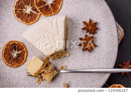 Piece of cheesecake with nuts and berries with winter pattern Piece of cheesecake with nuts and berries with winter pattern 124306167