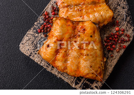 Grilled fish fillet with salt, spices and herbs 124306291