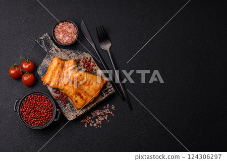 Grilled fish fillet with salt, spices and herbs 124306297