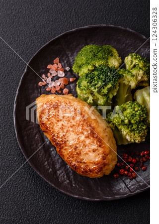Delicious fresh green broccoli steamed in a ceramic plate 124306328