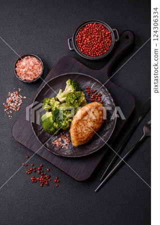 Delicious fresh green broccoli steamed in a ceramic plate Delicious fresh green broccoli steamed in a ceramic plate 124306334