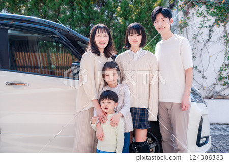 Family going on a trip by car Family going on a trip by car 124306383
