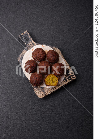 Fried chickpea falafel balls with salt, spices and herbs Fried chickpea falafel balls with salt, spices and herbs 124306450