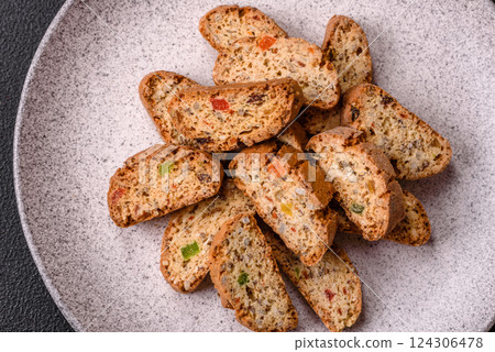 Freshly baked Italian cantuccini cookies with nuts and candied fruits Freshly baked Italian cantuccini cookies with nuts and candied fruits 124306478