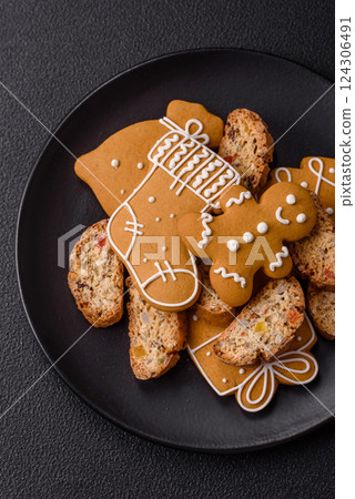 Christmas cantuccini cookies with nuts and candied fruits, gingerbread Christmas cantuccini cookies with nuts and candied fruits, gingerbread 124306491