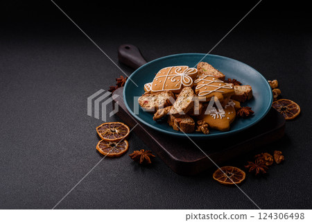 Christmas cantuccini cookies with nuts and candied fruits, gingerbread Christmas cantuccini cookies with nuts and candied fruits, gingerbread 124306498