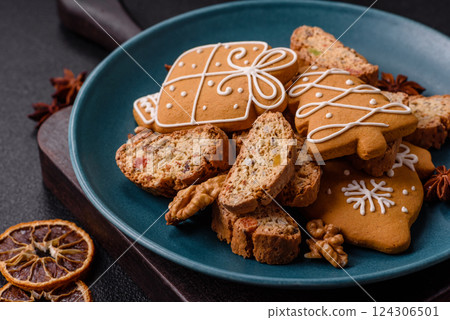 Christmas cantuccini cookies with nuts and candied fruits, gingerbread Christmas cantuccini cookies with nuts and candied fruits, gingerbread 124306501