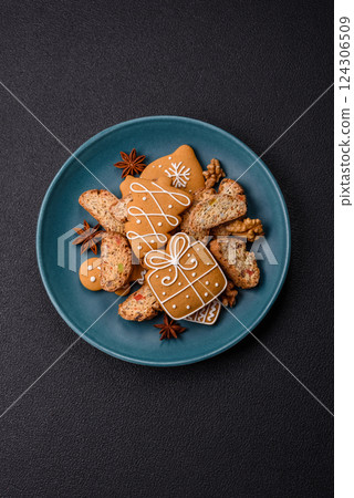 Christmas cantuccini cookies with nuts and candied fruits, gingerbread Christmas cantuccini cookies with nuts and candied fruits, gingerbread 124306509