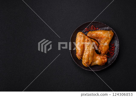 Grilled chicken wings with salt and spices Grilled chicken wings with salt and spices 124306853