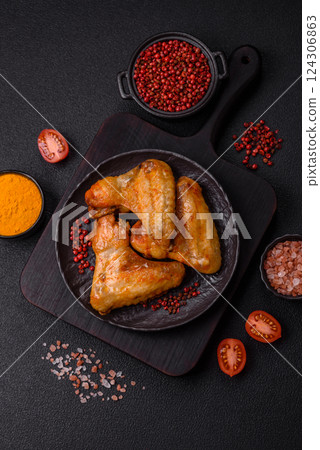 Grilled chicken wings with salt and spices Grilled chicken wings with salt and spices 124306863