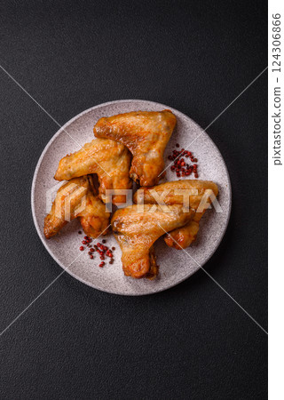 Grilled chicken wings with salt and spices Grilled chicken wings with salt and spices 124306866